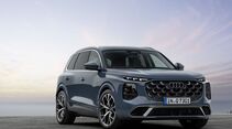 Audi Q7 Generation 3 in Frontansicht mit großem Kühlergrill und LED-Lichtsignatur.