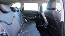 Blick auf die Rückbank und den Fond des GWM Haval H6 mit schwarzer Lederausstattung.