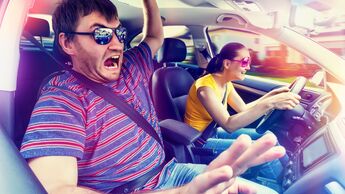 Couple travelling by car