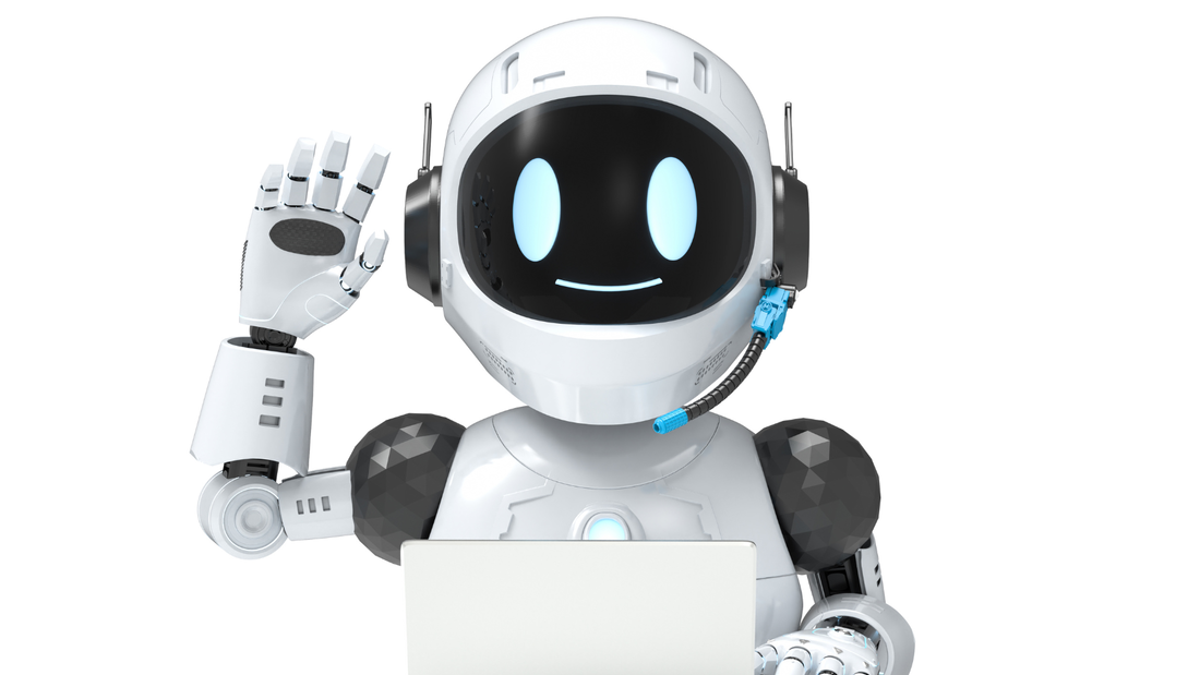 Ein weißer KI-Roboter sitzt vor einem Laptop und hebt die Hand.