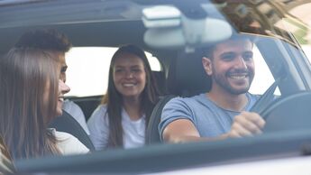Group of friends on a car