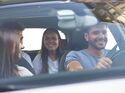 Group of friends on a car