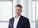 Kai Vogler, Generalbevollmächtigter für Vertrieb und Marketing bei Volkswagen Financial Services, in einem offiziellen Porträt.