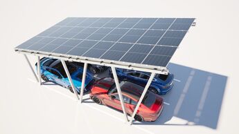 Solarcarport mit Photovoltaikmodulen über mehreren geparkten Autos als Beispiel für lokale Stromerzeugung.