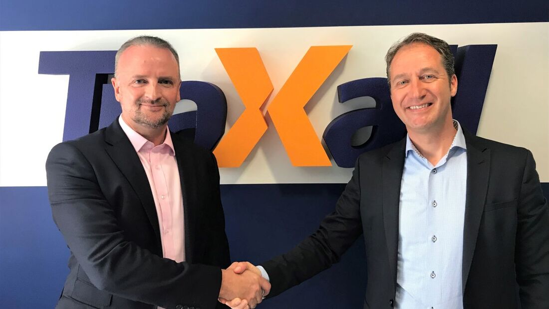 TraXall CEO Ross Jackson welcomes Leomont Wouda International Business Development Director.jpg